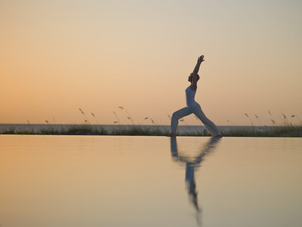 Yoga by the pool at COMO Parrot Cay Turks and Caicos